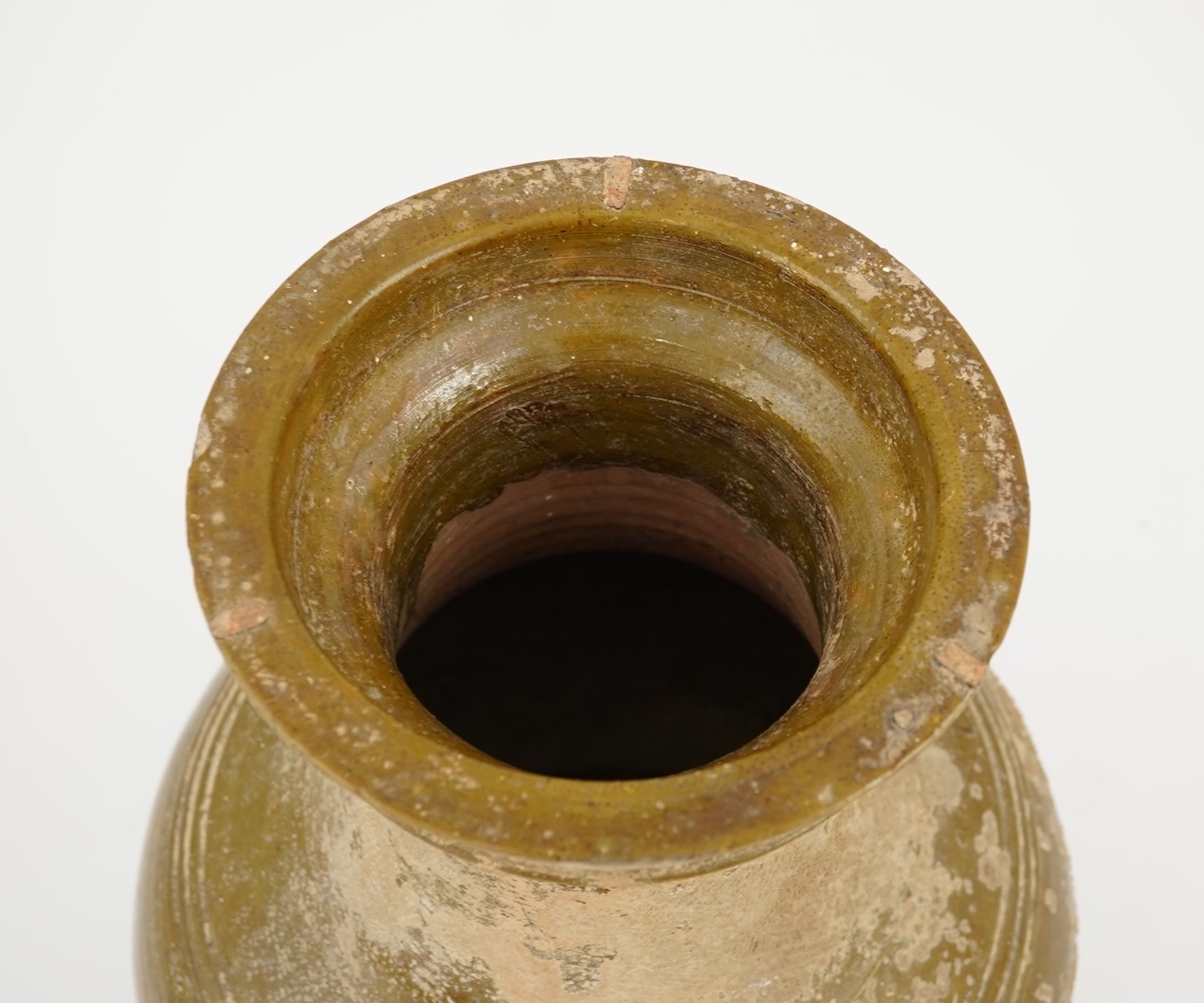 A large Chinese green glazed earthenware jar, hu, Han dynasty